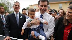 Image: U.S. Democratic presidential candidate Mayor Pete Buttigieg picks up