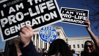 Image: Pro-life and pro-choice activists during the March for Life in front