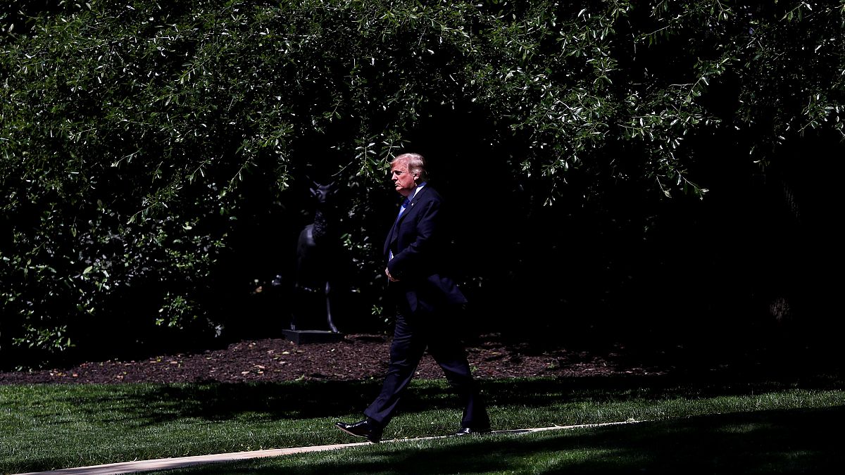 Image: President Donald Trump leaves the White House on May 14, 2019.