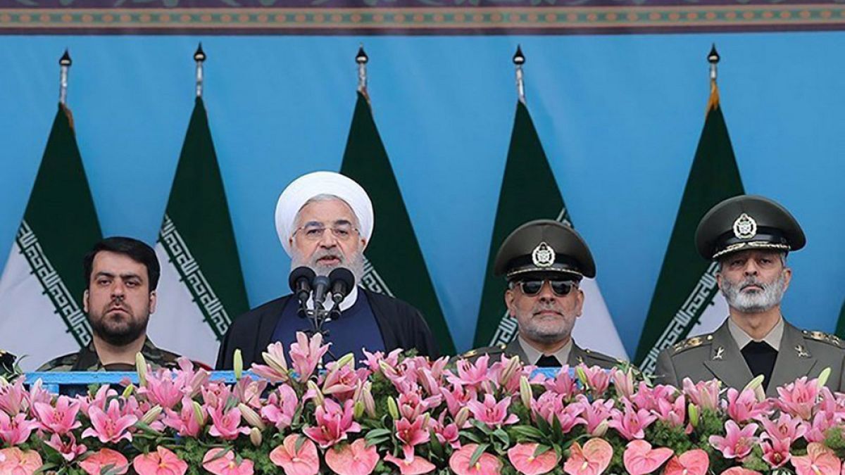 Image: Iranian President Hassan Rouhani delivers a speech during the ceremo