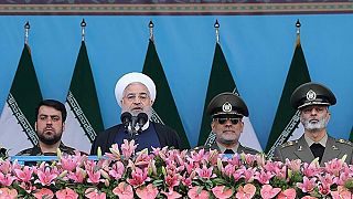 Image: Iranian President Hassan Rouhani delivers a speech during the ceremo