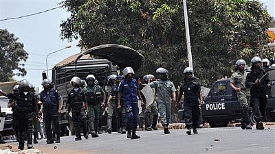 Rioters burn down police buildings in Guinea mining town, 17 injured