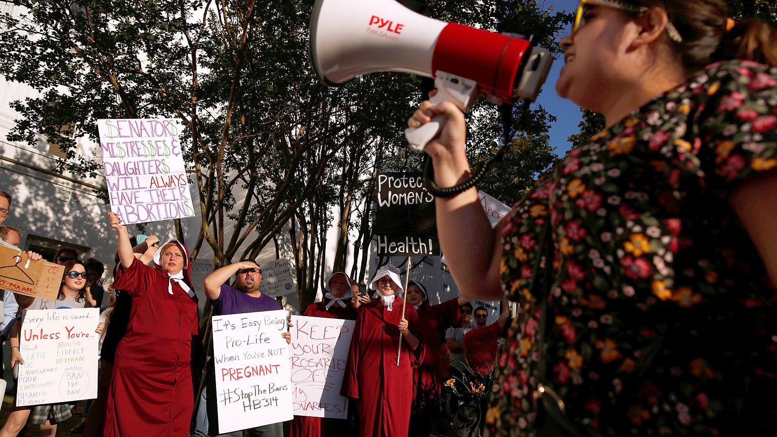 Image: Pro-choice supporters protest in front of the Alabama State House as