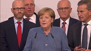 Блок Меркель одержал победу на выборах в Бундестаг