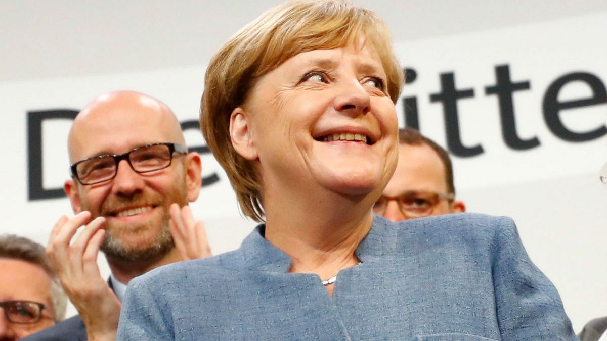 Merkel 12 yıllık koltuğunu kaptırmadı