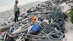 Lead author Jennifer Lavers looks out at the plastic debris covering a Coco