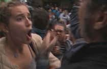 Clashes between riot police and referendum supporters in Catalonia