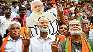 Image: Indian supporters and party workers of Bharatiya Janata Party (BJP) 