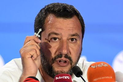 Italian Deputy Prime Minister and Interior Minister Matteo Salvini holds a rosary during a press conference in Milan on Sunday.