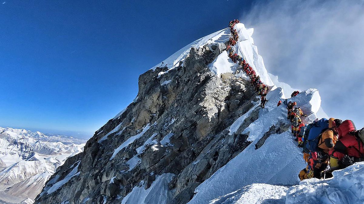 Image: Climbers line up near the summit of Mount Everest