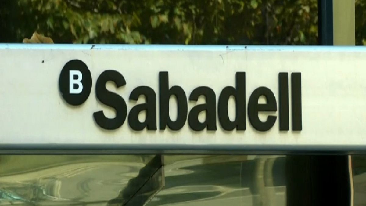 Spain’s Caixabank and Gas Natural quit Catalonia