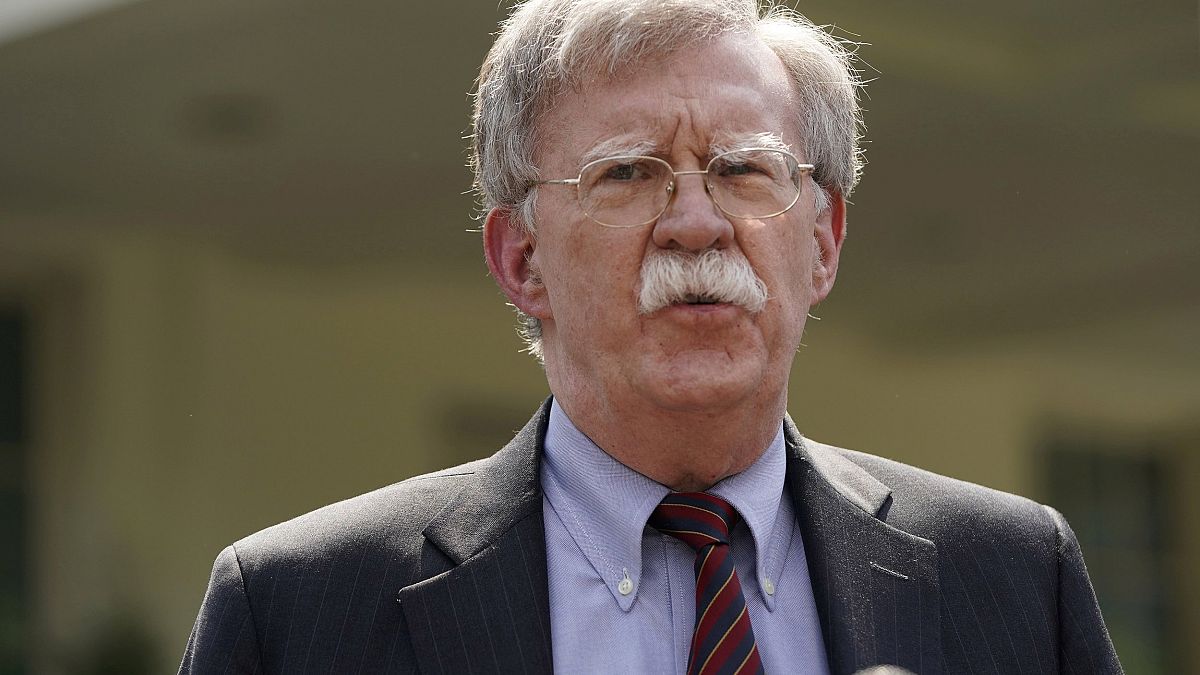 Image: White House national security adviser John Bolton takes questions a 