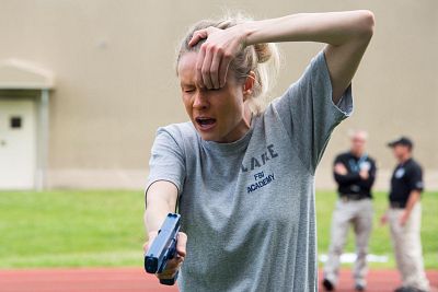 Plaintiff Clare Coetzer is seen during training at Quantico. She was intentionally maced as part of her training.
