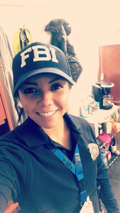 Paula Bird pictured with an FBI cap. During training, said Bird, "It became very clear that there were people that they considered that needed to be watched, and that group would have majority females."