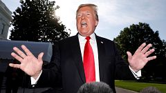 Image: President Trump speaks to reporters as he departs for travel to Colo