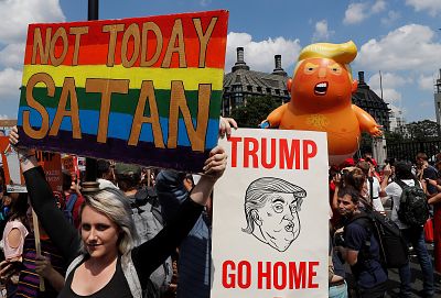 Demonstrators protest against President Donald Trump\'s visit to the U.K. in July 2018.