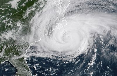 This satellite image provided by NOAA shows Hurricane Florence on the eastern coast of the United States on Sept. 14, 2018.