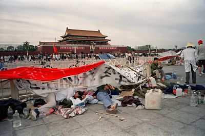 This file photo taken on May 21, 1989 shows students sleeping on the ground at Tiananmen Square in Beijing as student sit-ins entered their ninth day during the Beijing Spring movement.