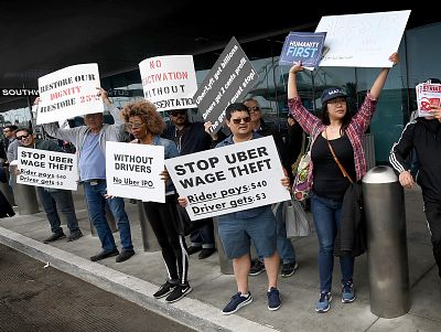 Rideshare drivers for Uber and Lyft stage a strike and protest at the LAX International Airport, over what they say are unfair wages in Los Angeles on May 8, 2019.