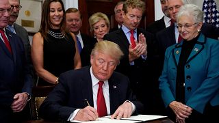 Trump attacks Obamacare with executive order