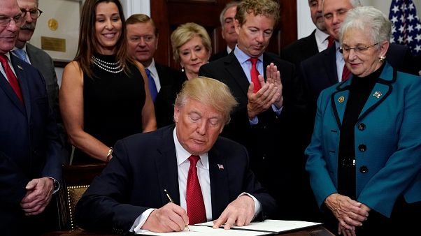 Trump attacks Obamacare with executive order Trump attacks Obamacare with executive order