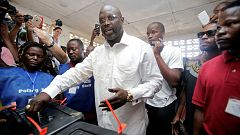 Liberian elections: Former footballer George Weah leads in provisional first-round results