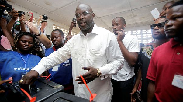 Liberian elections: Former footballer George Weah leads in provisional first-round results Liberian elections: Former footballer George Weah leads in provisional first-round results
