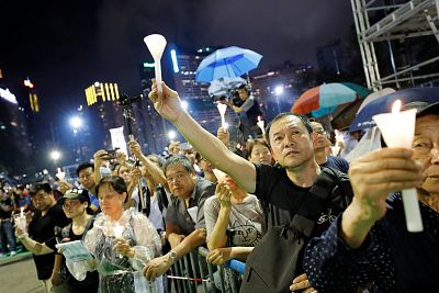 Thousands of people take part in a candlelight vigil to mark the 30th anniversary of the crackdown of pro-democracy movement at Beijing\'s Tiananmen Square in 1989, at Victoria Park in Hong Kong, China June 4, 2019.