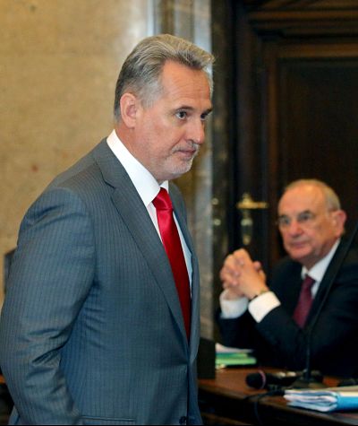 Ukrainian oligarch Dmytro Firtash waits for the start of his trial at the main court in Vienna, Austria,on April 30, 2015.