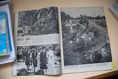 The photo in Life magazine showing Henry-Jean Renaud\'s mother, Simone Renaud, laying flowers at the grave of Theodore Roosevelt Jr.,  in Normandy, France on June 4, 2019.
