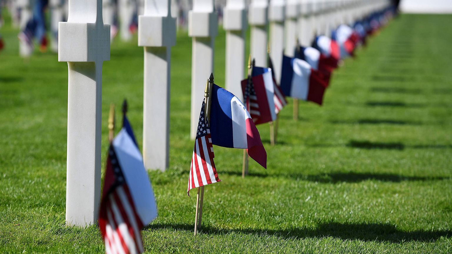 Image: French and U.S. flags at the Normandy American Cemetery and Memorial