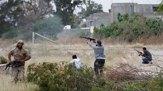 Image: A fighter loyal to Libya's U.N.-backed government (GNA) fires an AK-