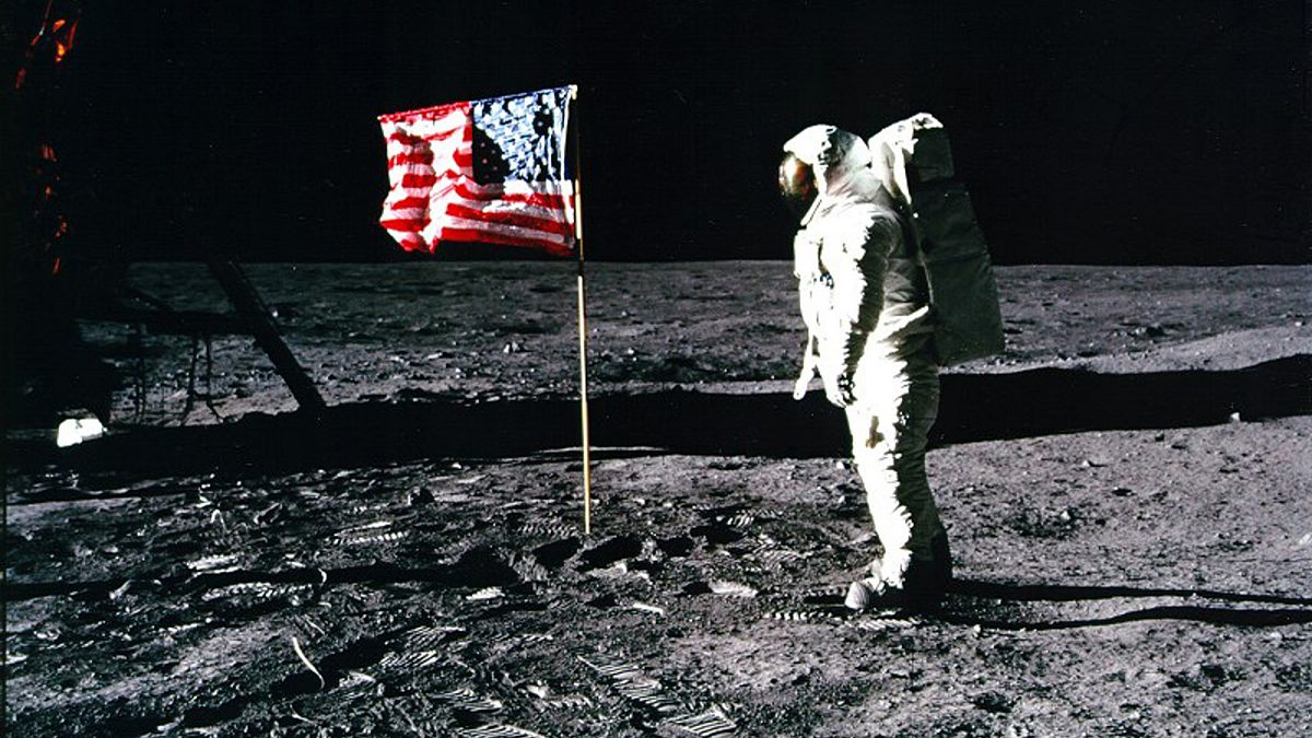 Image: Astronaut Buzz Aldrin salutes the American flag on the surface of th