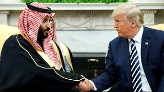 Image: President Donald Trump shakes hands with Saudi Arabia's Crown Prince