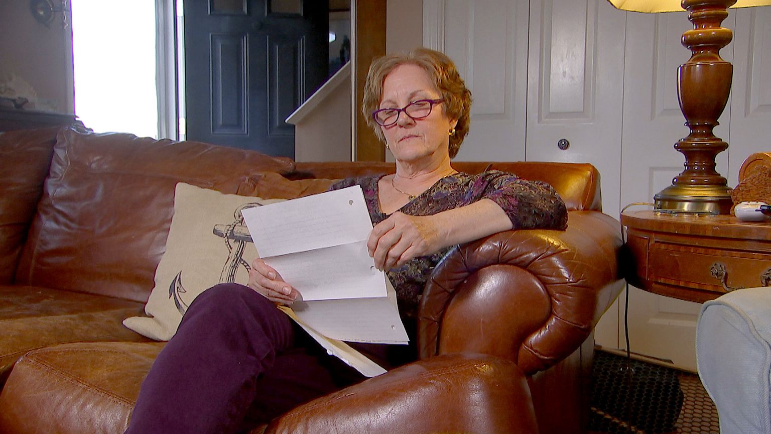 Janet Uhlar, a former juror on the James "Whitey" Bulger trial, reads a let