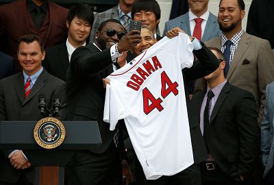 David Ortiz poses for a selfie with President Barack Obama during a ceremony to honor the 2013 World Series champion Boston Red Sox at the White House on April 1, 2014.