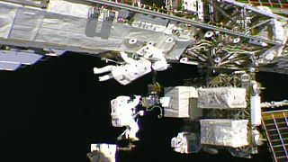 Live: Astronauts look down on the earth from the ISS during a spacewalk