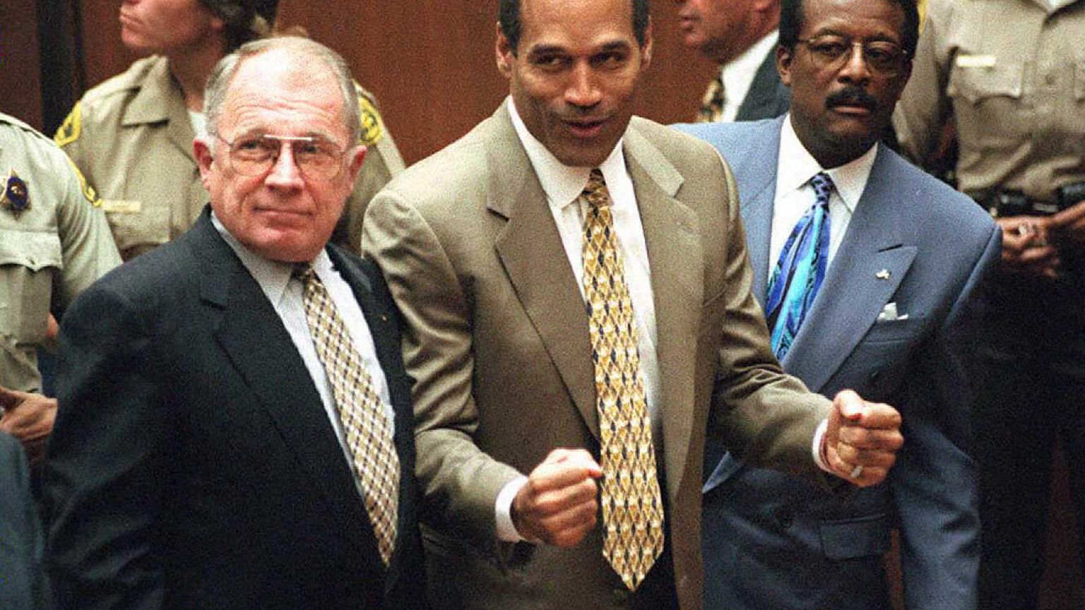IMAGE: F. Lee Bailey, O.J. Simpson and Johnnie L. Cochran in 1995