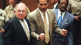 IMAGE: F. Lee Bailey, O.J. Simpson and Johnnie L. Cochran in 1995