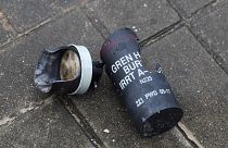 Image: A used tear gas shell on a pavement a day after a violent demonstrat