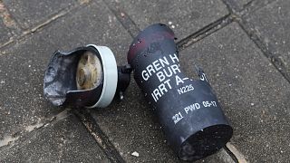 Image: A used tear gas shell on a pavement a day after a violent demonstrat
