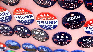 Image: FILE PHOTO: Biden for President campaign buttons and Impeach Trump N