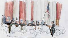 Image: Lawyer to Terance Gamble, Louis A. Chaiten speaks at the lectern for