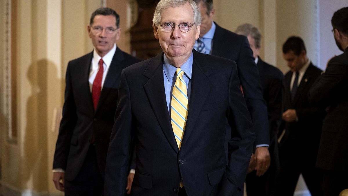 Image: Senate Majority Leader Mitch McConnell arrives to speak with reporte