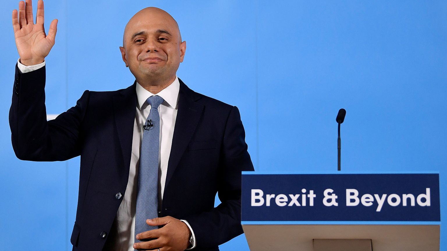 Image: Britain's Home Secretary Sajid Javid gestures as he speaks during th