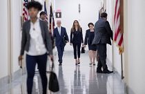 Image: Former White House communications director Hope Hicks arrives for cl