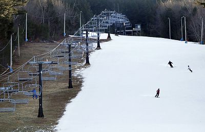 Some resort operators need to make their own snow in order to keep runs open, as was the case here at the Shawnee Peak ski area in Maine in 2012.