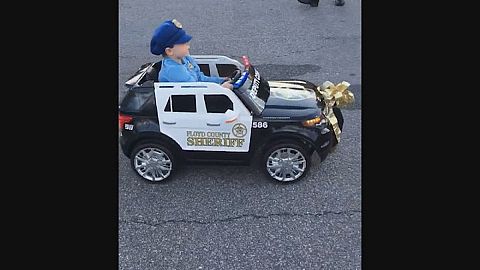 Budding police officer given toy prowler in Georgia, USA