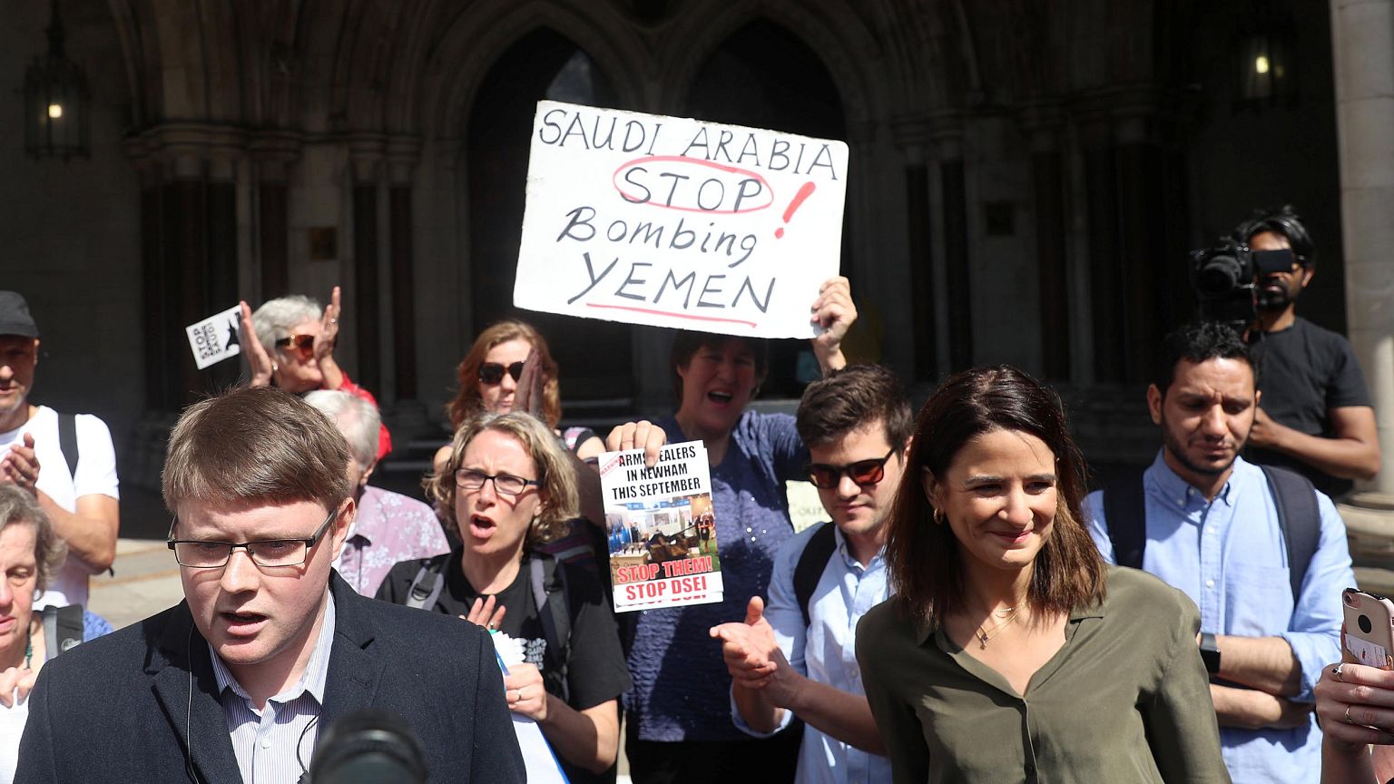 Image: Campaign Against Arms Trade (CAAT) spokesman Andrew Smith talks to t