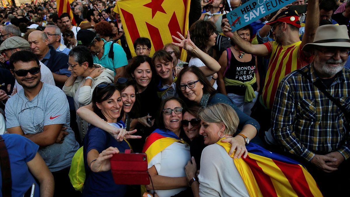Catalan lawmakers burst into song after independence declaration